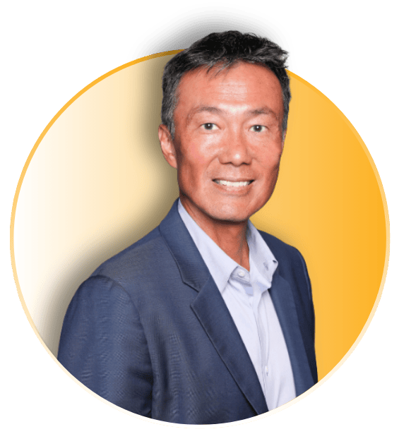 Benjamin Lam smiling in a blue blazer in a circular portrait with a gold gradient background