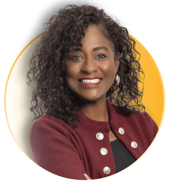 Shanda Lucas-O'Dennis smiling in a burgundy jacket in a circular portrait with a gold gradient background